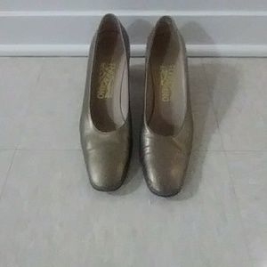 Ferragamo gold metallic pumps